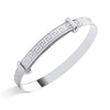 Silversmiths sterling silver expanding baby bangle featuring a Greek key pattern.