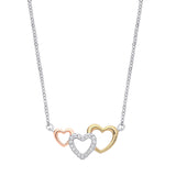 A sterling silver necklace with three cubic zirconia hearts in rose and yellow gold on a fine silver chain.