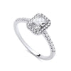 Sterling silver ring by Silversmiths featuring a 9x7mm emerald-cut CZ and small halo accents.