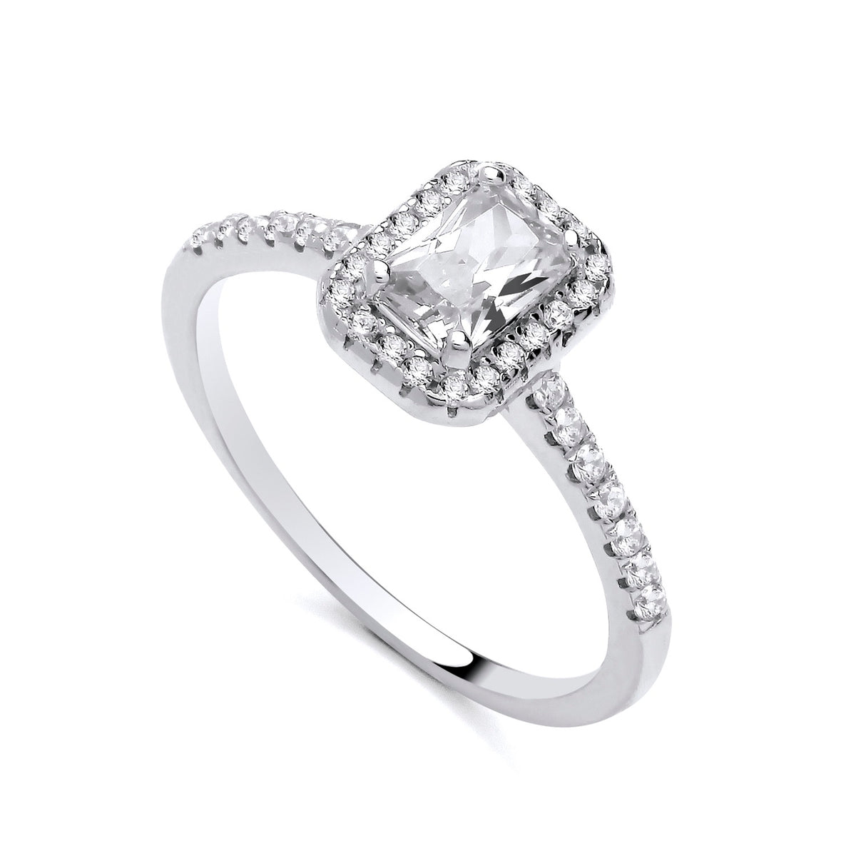 Sterling silver ring by Silversmiths featuring a 9x7mm emerald-cut CZ and small halo accents.