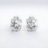 Silversmiths sterling silver stud earrings with 5mm round cubic zirconia stones.