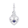 Sterling silver Claddagh pendant with a simulated tanzanite heart and a Celtic knot bail.