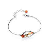 Sterling silver bracelet with multicolour Baltic amber and an adjustable marquise hook clasp.