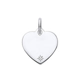 Sterling silver heart pendant by Silversmiths featuring a star-set cubic zirconia near the lower right edge.