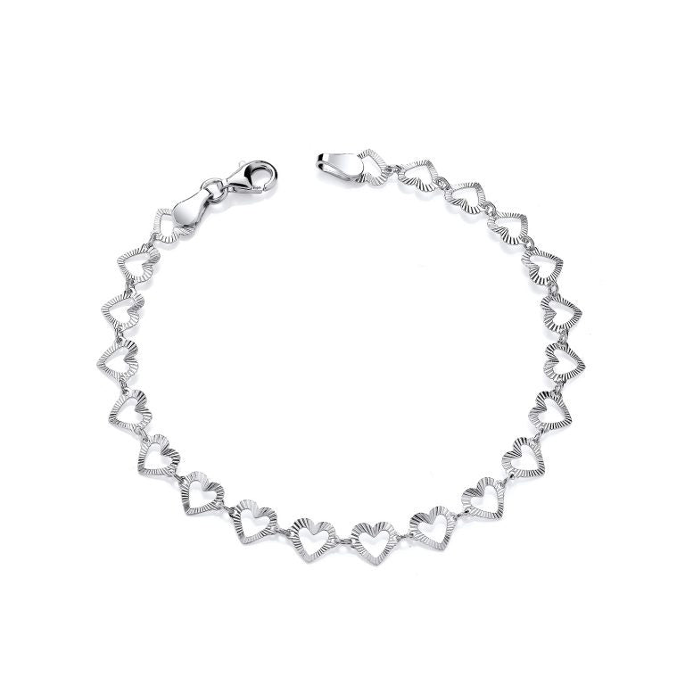 A sterling silver diamond cut heart link bracelet with a lobster clasp is displayed on a plain white background.