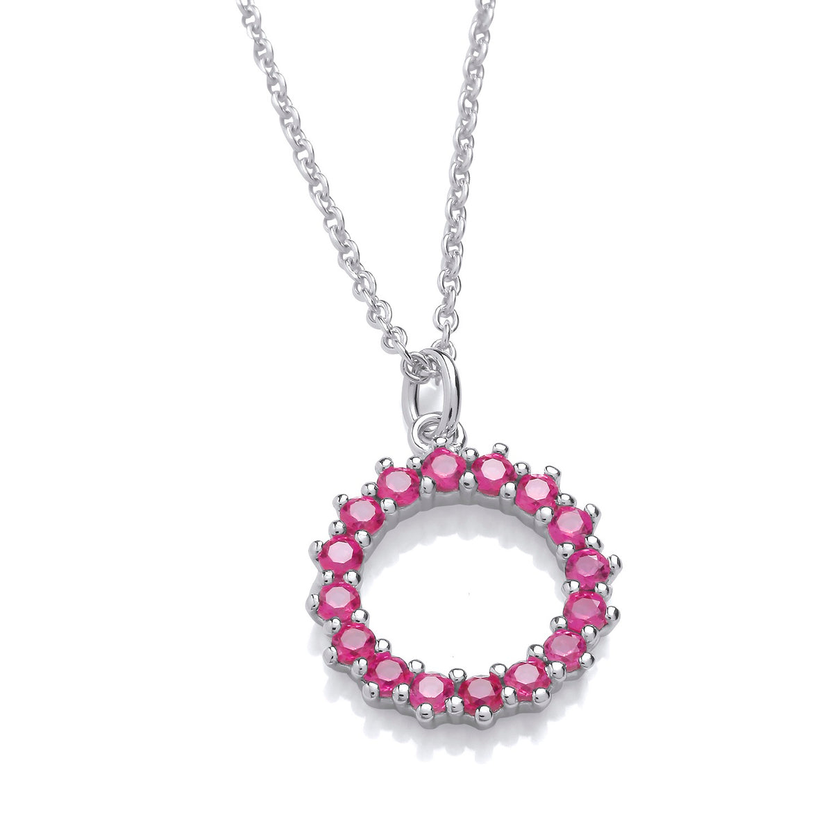Silversmiths sterling silver necklace with a simulated ruby set in a circular pendant.