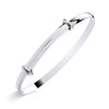 Sterling silver 4mm expanding bangle with D-shaped profile, two accents, and a minimalist bar design.