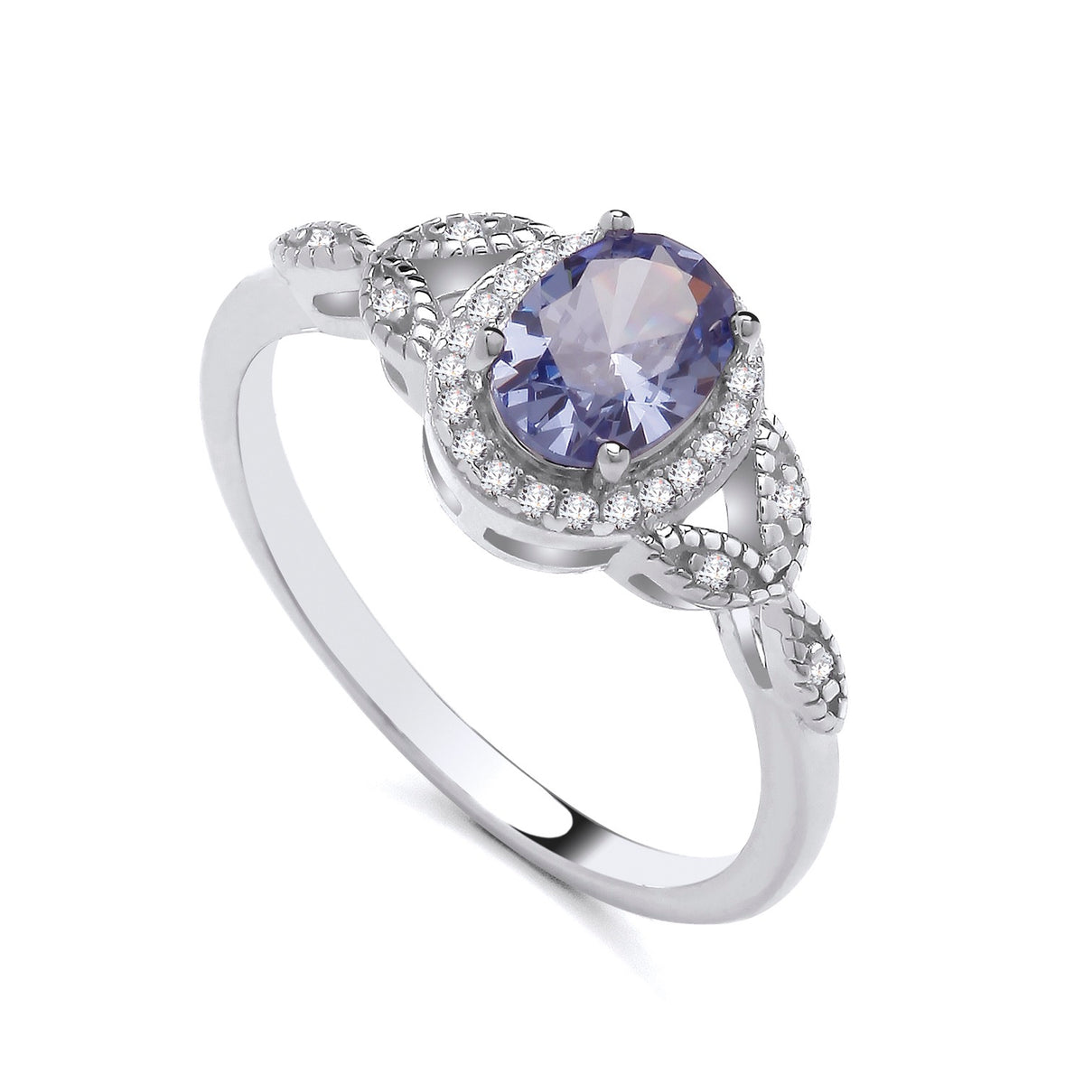 Sterling silver ring with simulated tanzanite and clear stones set in a twisted shank design.