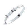 Sterling silver expanding baby bangle by Silversmiths features a floral pattern and two sliding clasps.