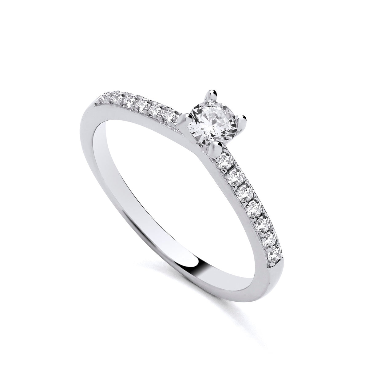 A sterling silver ring with cubic zirconia pavé shoulders lies against a plain white background.