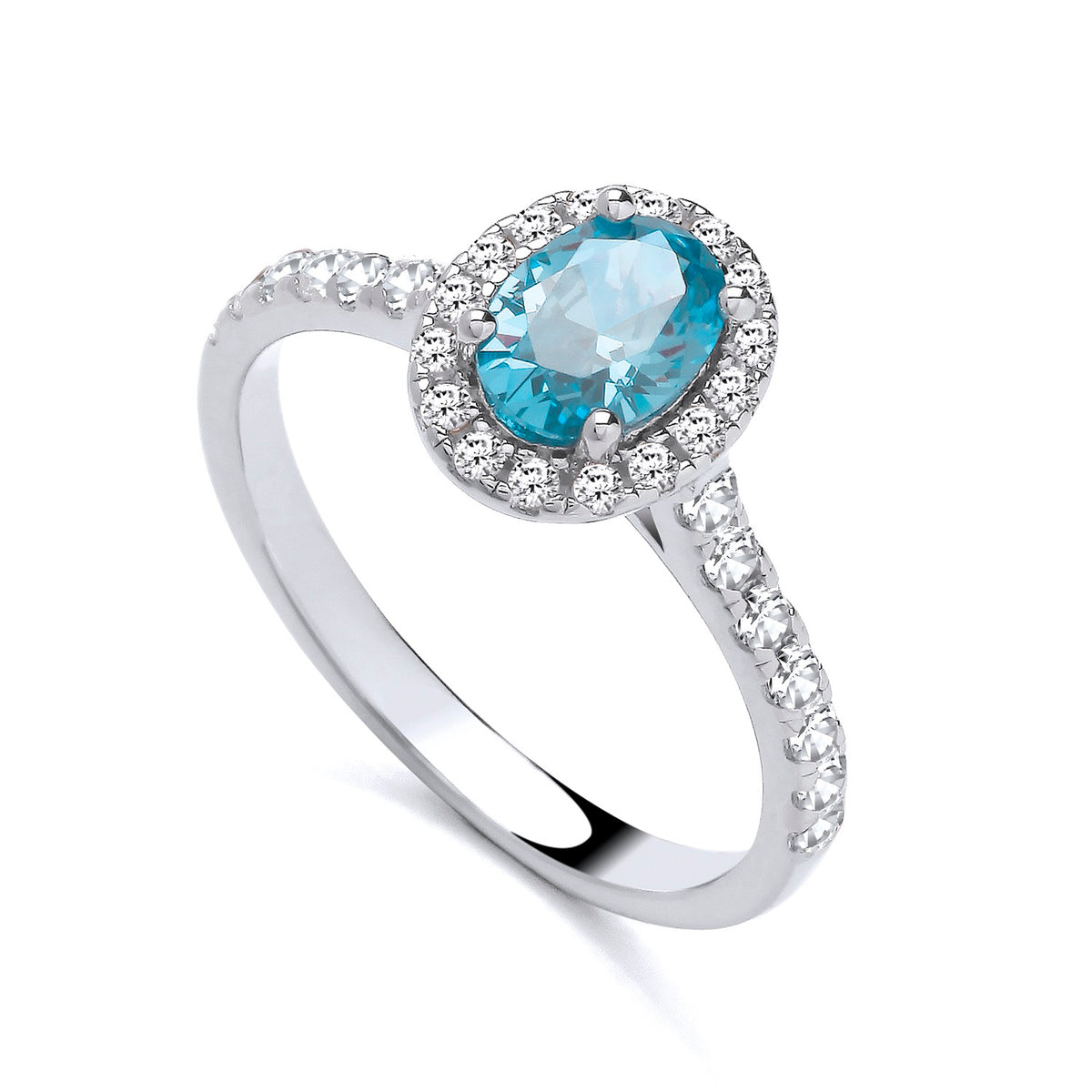 Sterling silver ring featuring a simulated aquamarine center, CZ halo, and gemstone accents on the band.