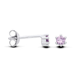 Silversmiths sterling silver stud earrings with round simulated amethyst in six-prong settings, shown front and side.