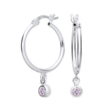 Sterling silver hoop earrings with simulated alexandrite and delicate pink stones by Silversmiths.