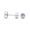 Silversmiths silver stud earrings with bezel-set simulated aquamarine stones and butterfly backings.