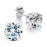 Sterling silver 7mm round cubic zirconia stud earrings with classic prong settings.