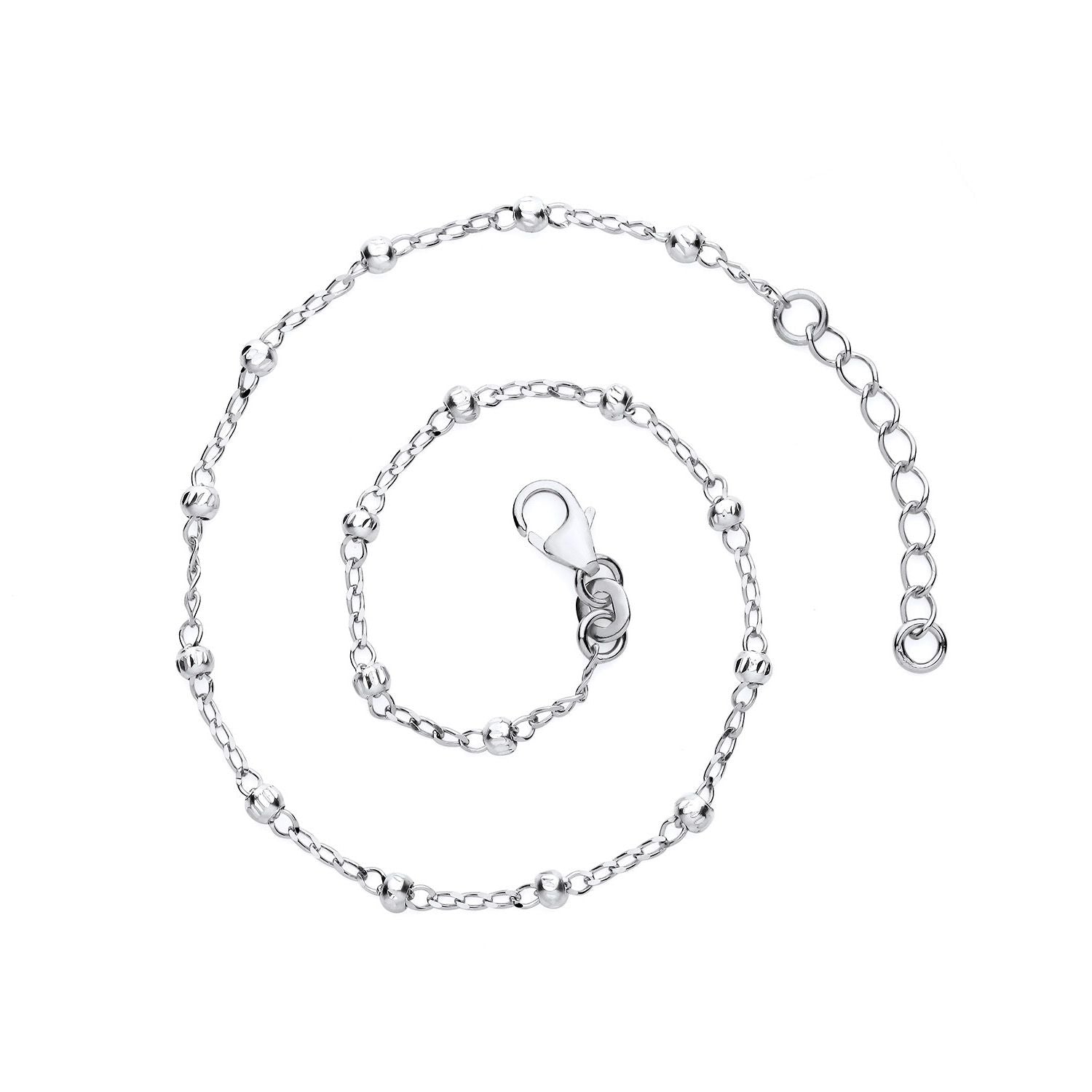 A Silversmiths sterling silver beaded rolo anklet with a 1″ extender is coiled on a plain white background.