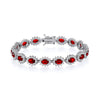 Sterling silver bracelet with simulated ruby oval halos and clear stones in a repeating pattern.