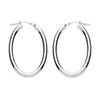 Sterling silver oval hoop earrings by Silversmiths, 34.5mm with hinged clasps, displayed on a white background.