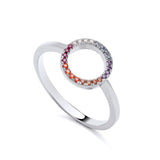 Sterling silver 10mm open circle ring featuring rainbow cubic zirconia gems along half of the band.