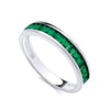 Sterling silver eternity ring by Silversmiths featuring channel-set simulated emerald baguette green stones.