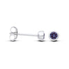 Silversmiths sterling silver stud earrings with 4mm simulated tanzanite in bezel setting, shown side and front.