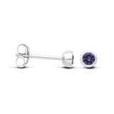 Silversmiths sterling silver stud earrings with 4mm simulated tanzanite in bezel setting, shown side and front.