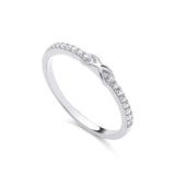 Sterling silver infinity ring with round cubic zirconia stones set on a twisted band.