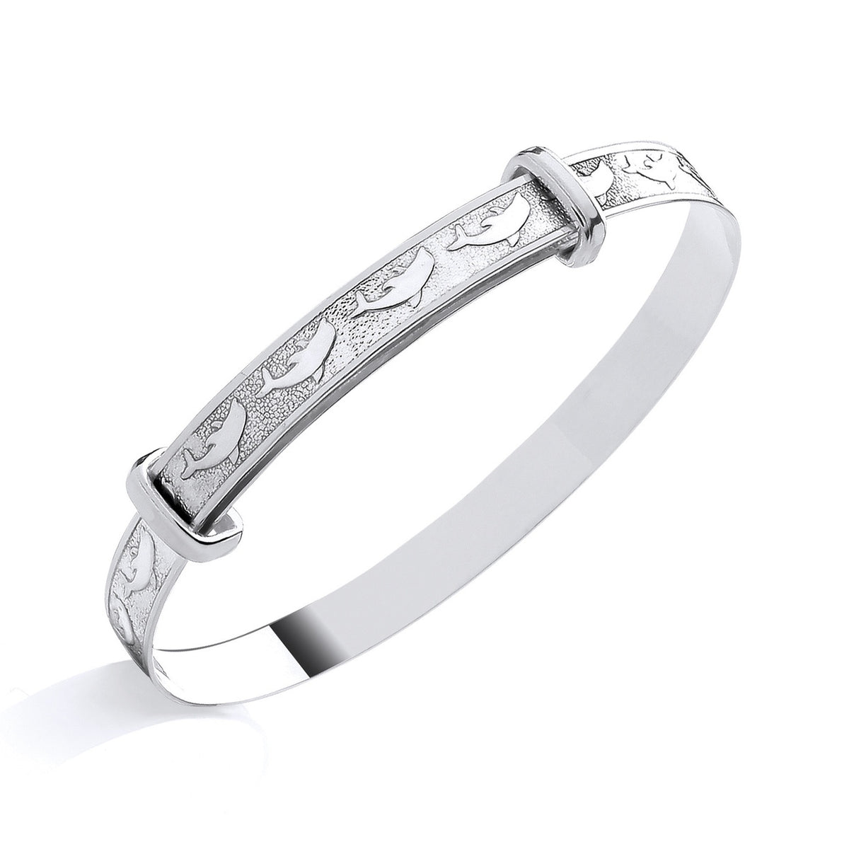 Sterling silver expanding baby bangle featuring a dolphin motif, shown on a smooth white background.
