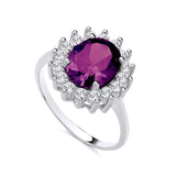 Sterling silver ring with simulated amethyst and CZ stones in an oval halo cluster by Silversmiths.