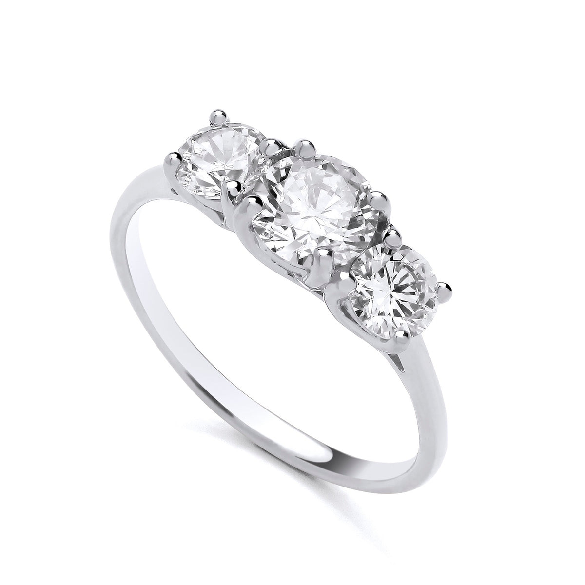 Sterling silver three-stone ring by Silversmiths features round cubic zirconia on a plain band.