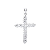A sterling silver cross pendant with cubic zirconia is displayed on a white background, showing its sparkling stones.
