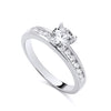 Silversmiths sterling silver ring featuring a cubic zirconia solitaire and channel-set accent stones.