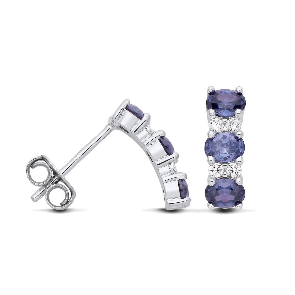These sterling silver earrings have three simulated tanzanite stones in a vertical drop with sparkling accents.