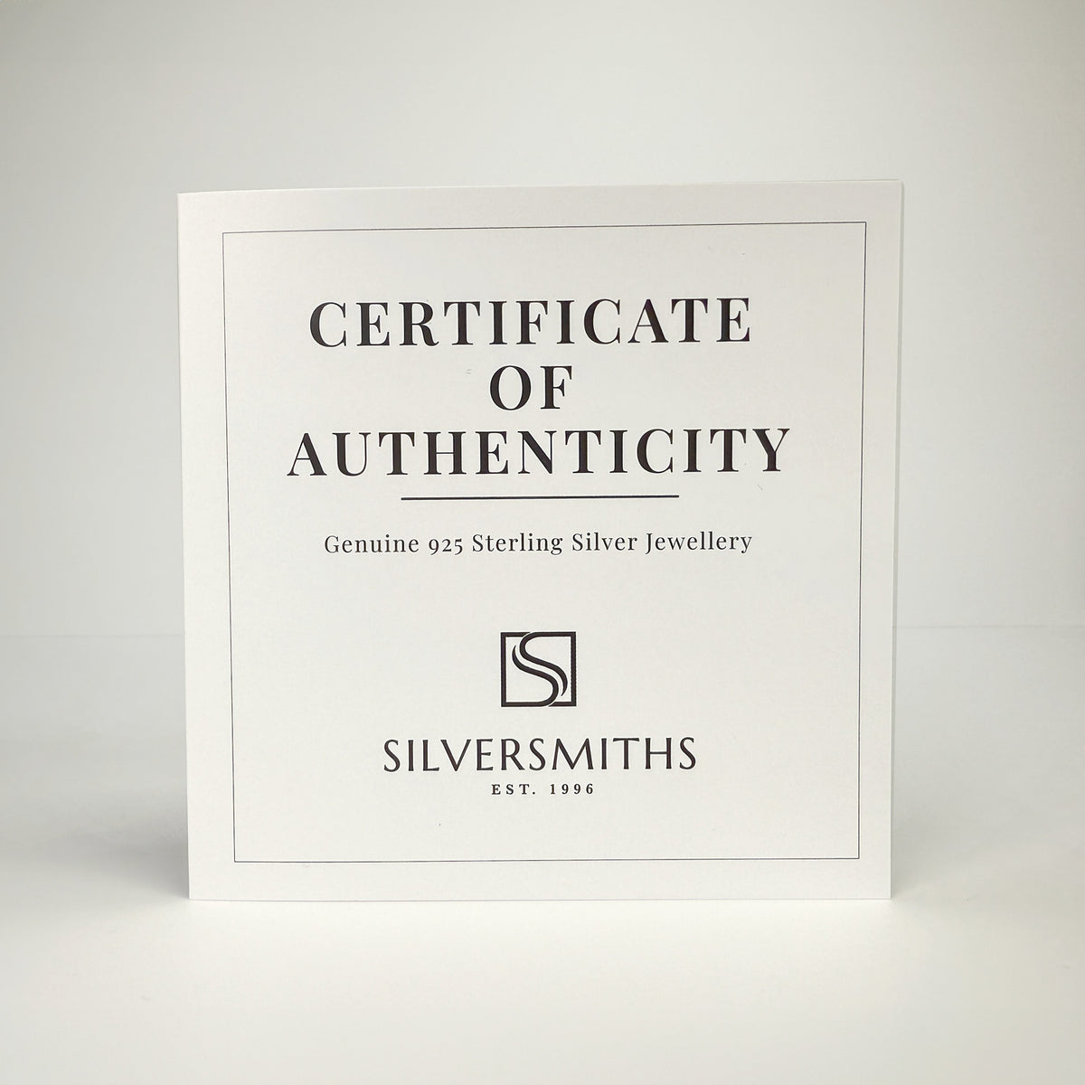Certificate of authenticity for Silversmiths’ Sterling Silver Rolo Multi Heart Station Anklet included.