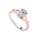 Rose gold plated sterling silver Claddagh ring featuring a cubic zirconia heart and detailed crown design.