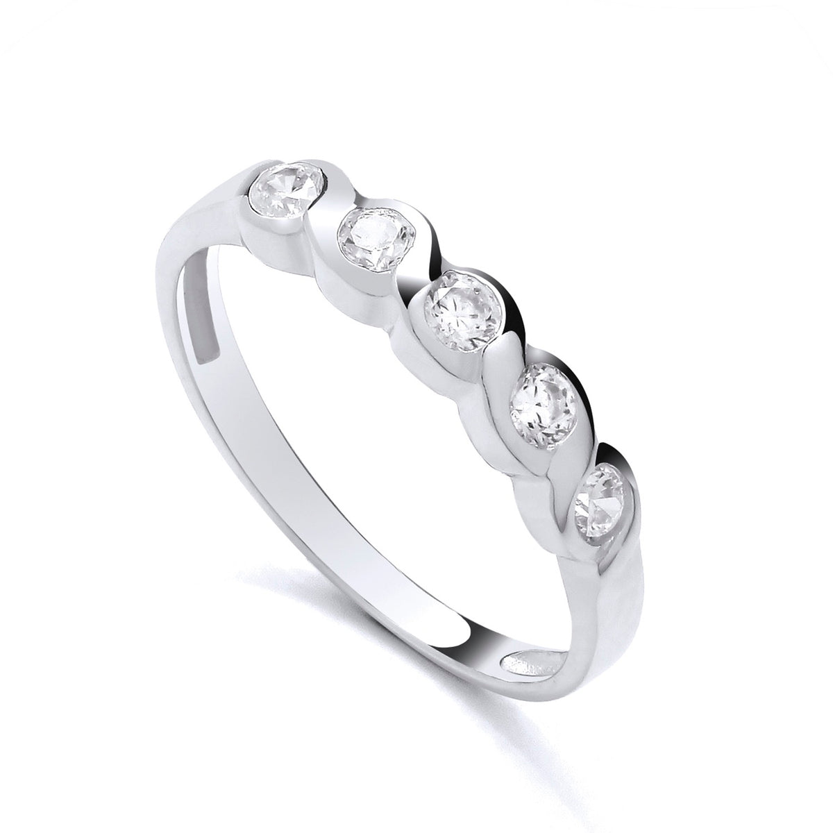 Sterling silver eternity ring with five bezel-set cubic zirconia stones on a wavy, polished band.