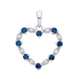 Sterling silver heart pendant featuring simulated sapphire and cubic zirconia, displayed on a plain white background.