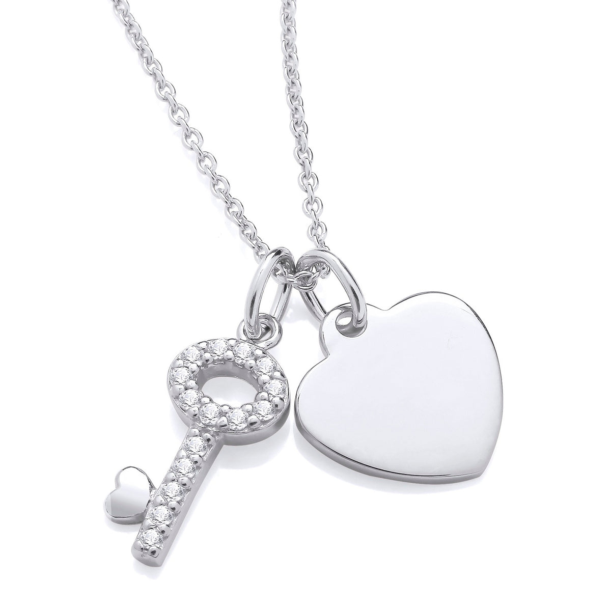 Silversmiths sterling silver necklace with cubic zirconia stones features a heart and key pendant design.