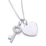Silversmiths sterling silver necklace with cubic zirconia stones features a heart and key pendant design.