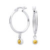Silversmiths sterling silver hoop earrings featuring simulated citrine stones for a touch of color.
