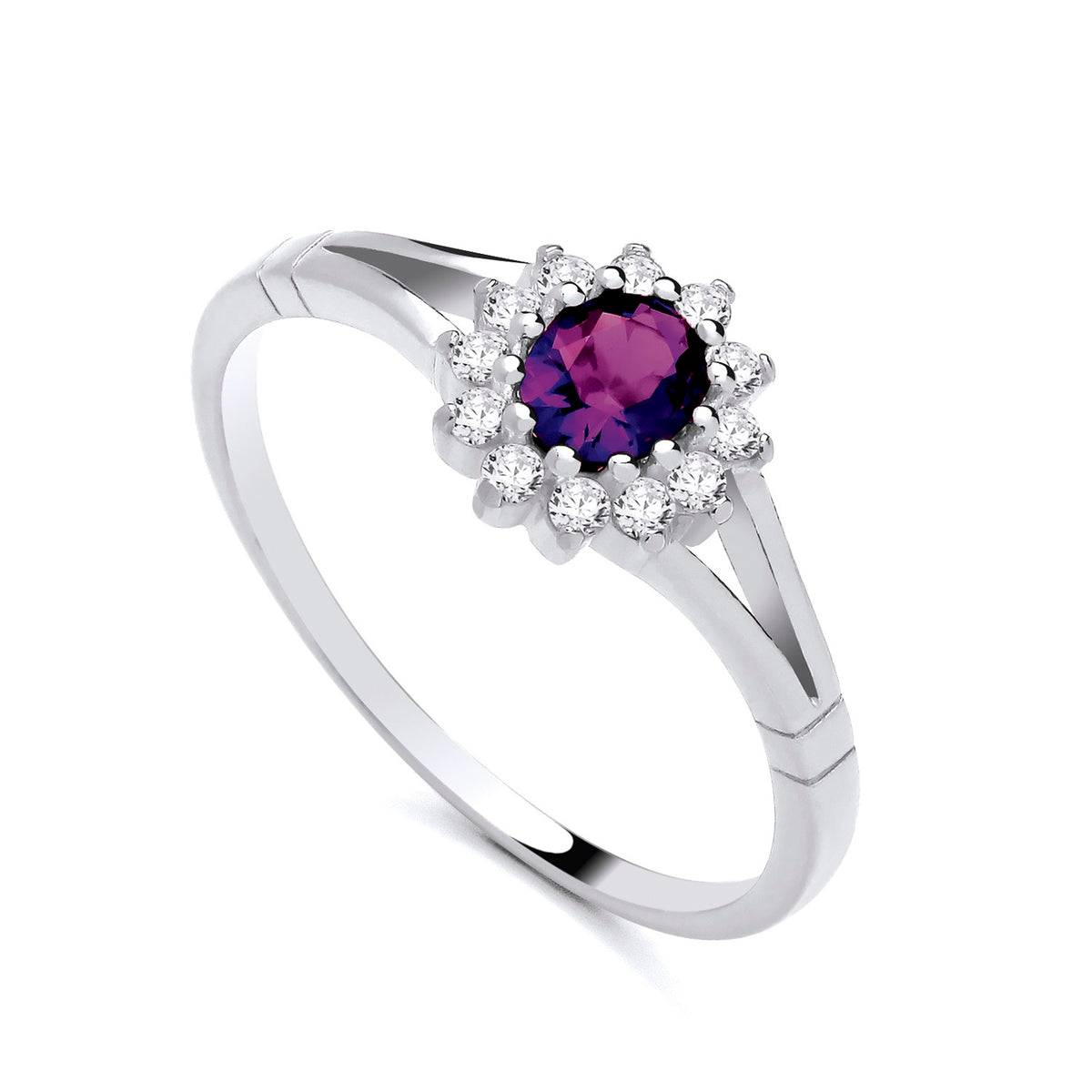 Sterling silver ring by Silversmiths with an oval simulated amethyst, split band, and a clear stone halo.